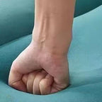 Citrus Colored Minimalist Chair next to Table