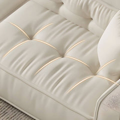 Close-up of pillows on loveseat