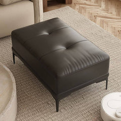 Sleek ottoman with brown metal legs