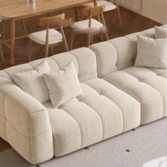 Comfy sofa with multiple decorative pillows