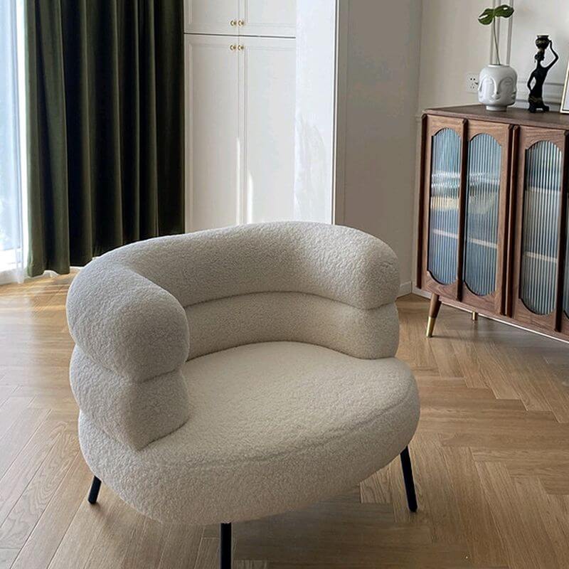 Minimalist solid color arm chair in white upholstery