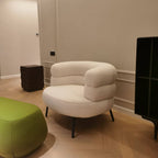 Arm chair with arched back design