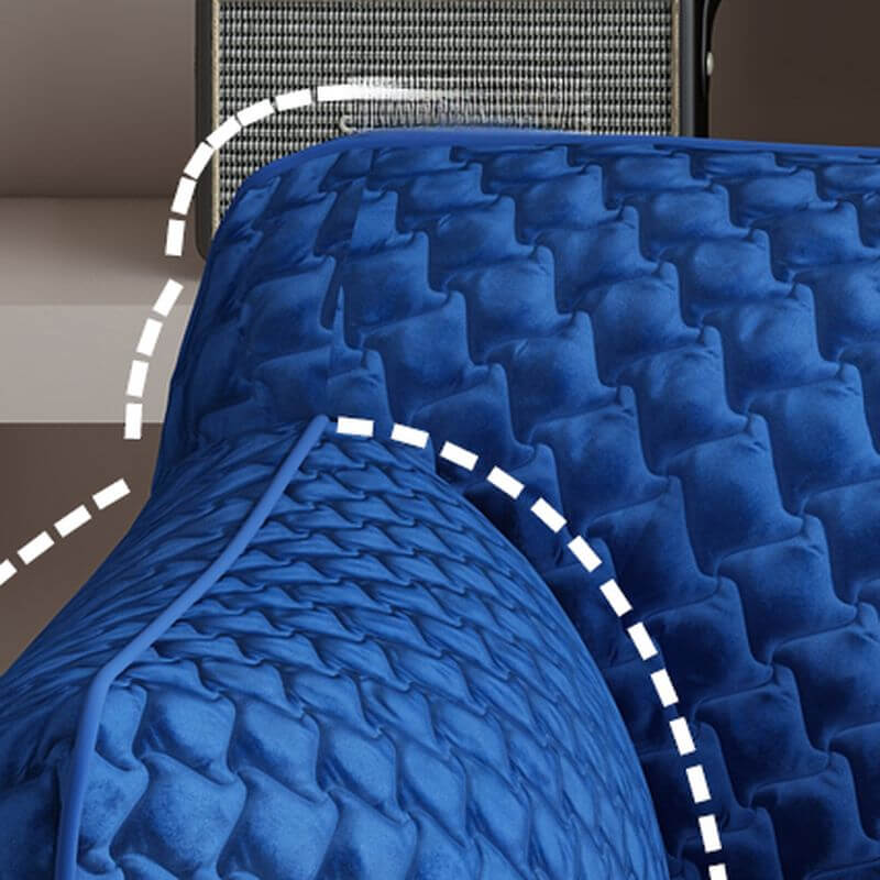 Armrest detail on light gray arm chair