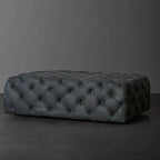 Modern black faux leather bench with tufted top
