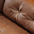 Cozy living space featuring auburn leather sofa
