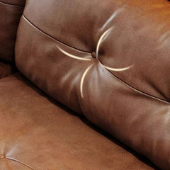 Cozy living space featuring auburn leather sofa