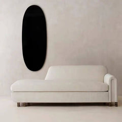 Minimalist white chaise lounge chair