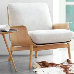 Removable cushions of the white slipcover arm chair