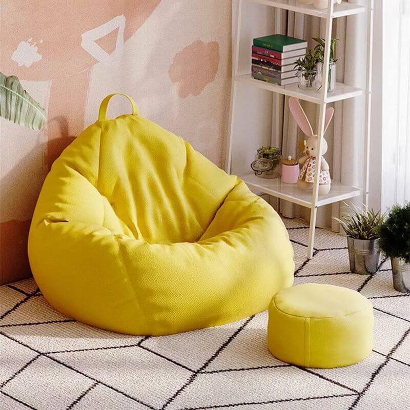 Pink bean bag chair in a cozy living room