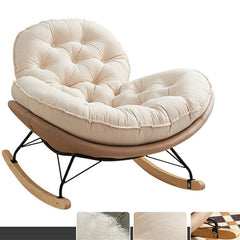 Beige upholstered rocking chair perfect for reading nook