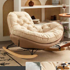 Beige upholstered rocking chair perfect for reading nook