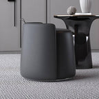 Light gray pouf ottoman offering comfort and style