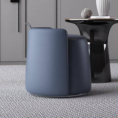 Modern faux leather pouf ottoman in black with silver legs