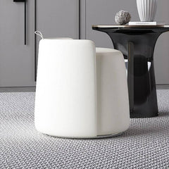 Dark gray pouf ottoman paired with modern furniture