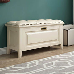 Stylish storage ottoman with nailhead trim