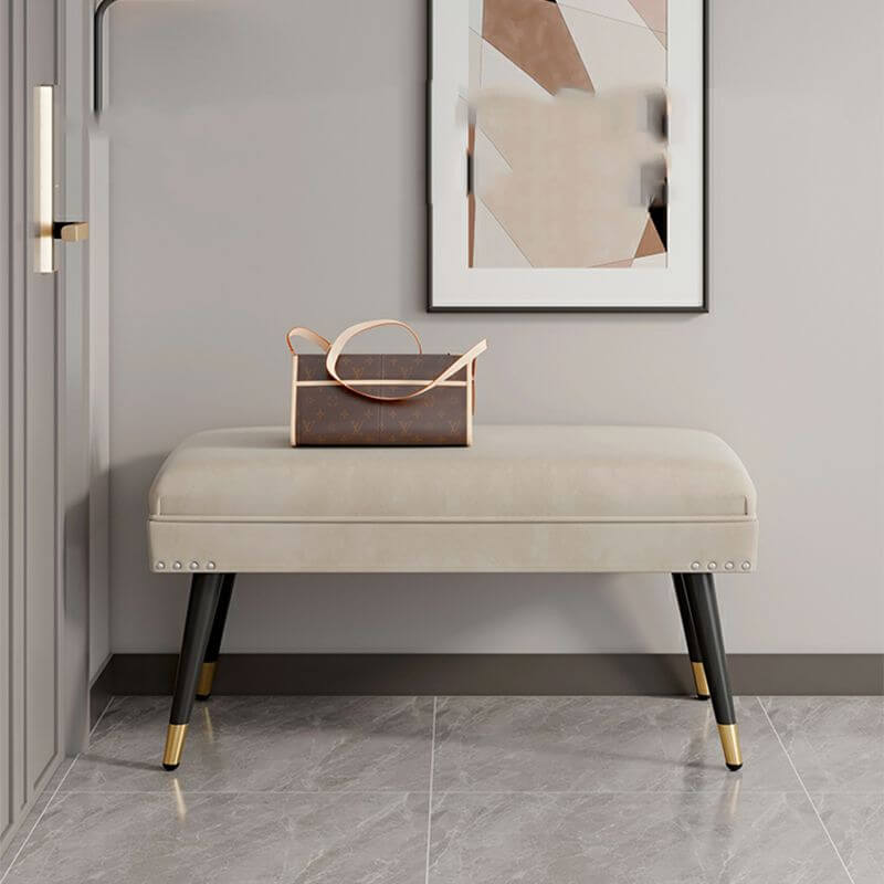 Dark gray rectangle footstool with gold accents