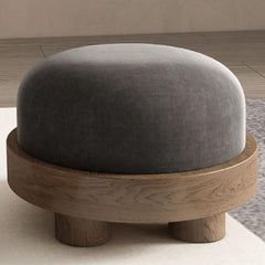 Stylish grey ottoman next to a sofa