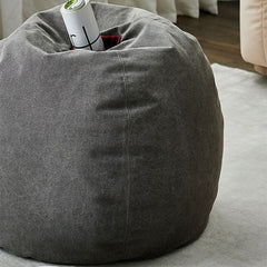 Cozy living room with gray cotton pouf