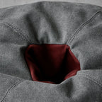 Gray pouf in a contemporary styled room