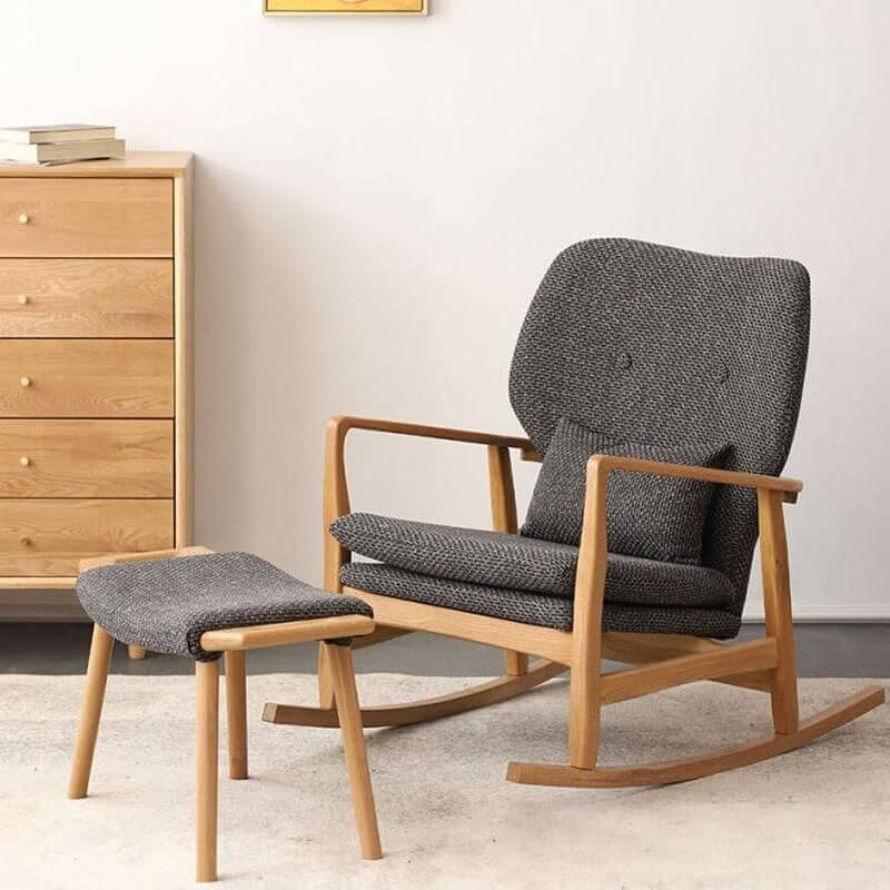 Modern indoor rocking chair with gray cotton upholstery