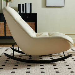 Cream colored rocking chair