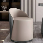 Close-up of faux leather upholstery on vanity stool