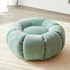 Elegant tufted seat of the ottoman