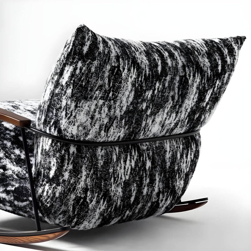 Stylish metal-framed rocking chair indoors