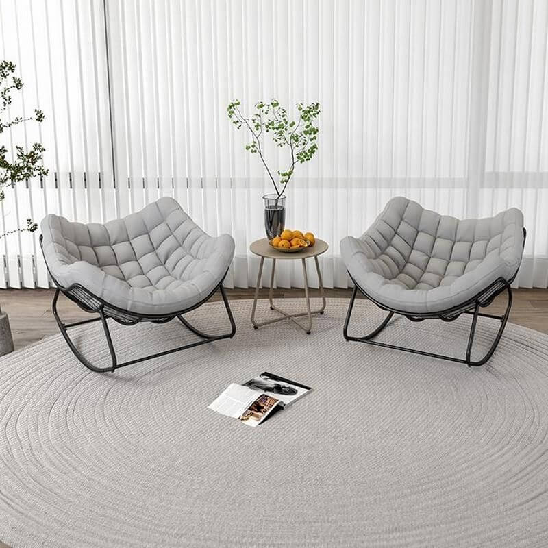 Modern rocking chair with tufted cotton upholstery