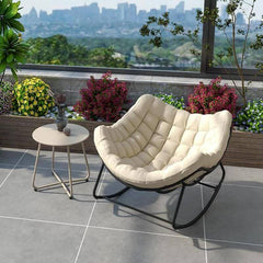 Stylish rocking chair in beige color