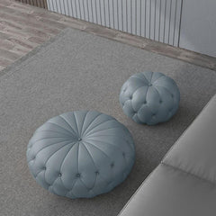 Modern Round Tufted Faux Leather Ottoman in Orange