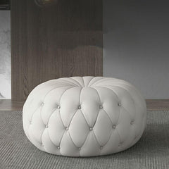 Chic Close-up of Tufting on Faux Leather Ottoman