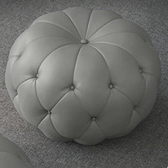 Elegant Round Ottoman in Grey for Chic Interiors