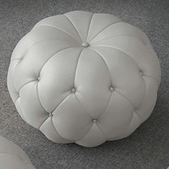 Chic Close-up of Tufting on Faux Leather Ottoman