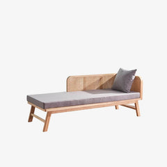 Natural wood frame of the gray chaise lounge