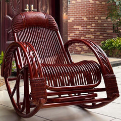 Modern rattan rocking chair in burgundy