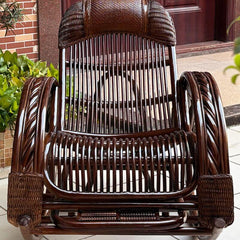 Stylish rocking chair on a front porch