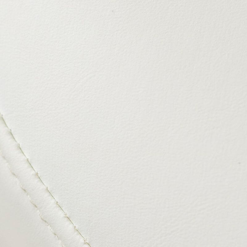 Living room accent with an upholstered vanity stool