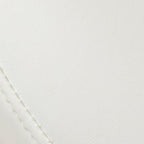 Living room accent with an upholstered vanity stool