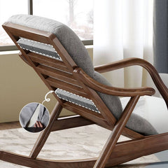 Stylish indoor rocking chair with a cozy throw