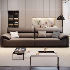 grey sofa with cushions