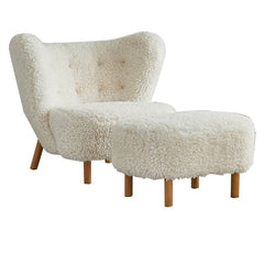 Armless chair showcasing nailhead trim