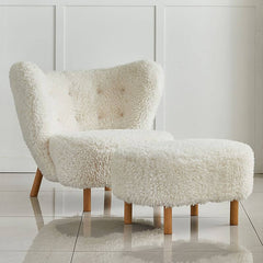 Comfortable modern wingback chair in living room