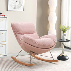 pink tufted rocking chair with spindle back