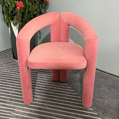 Orange upholstered stool with elegant armrest