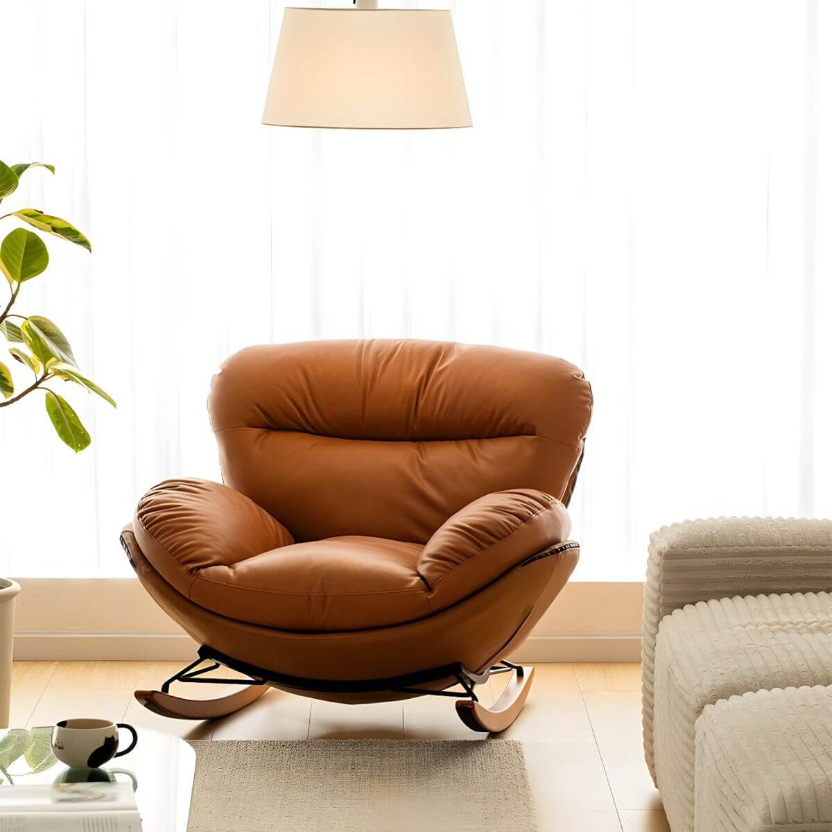 Modern upholstered rocking chair in brown leather