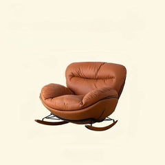 Comfortable rocking chair with brown wood legs