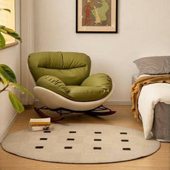 Elegant green rocking chair for indoor use