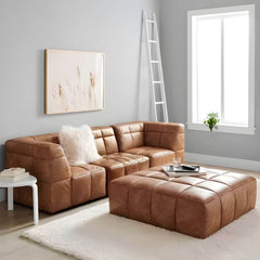 Stylish brown upholstered stool close-up view