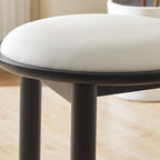 White upholstered vanity stool